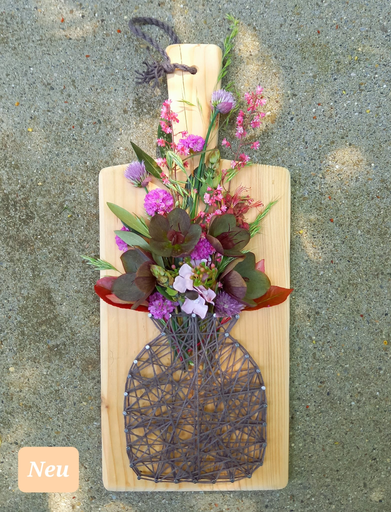 Wollvase auf Schneidebrett